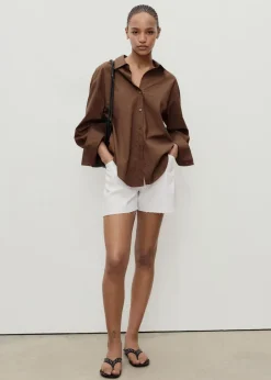 Denim shorts with frayed hem and pl>MANGO