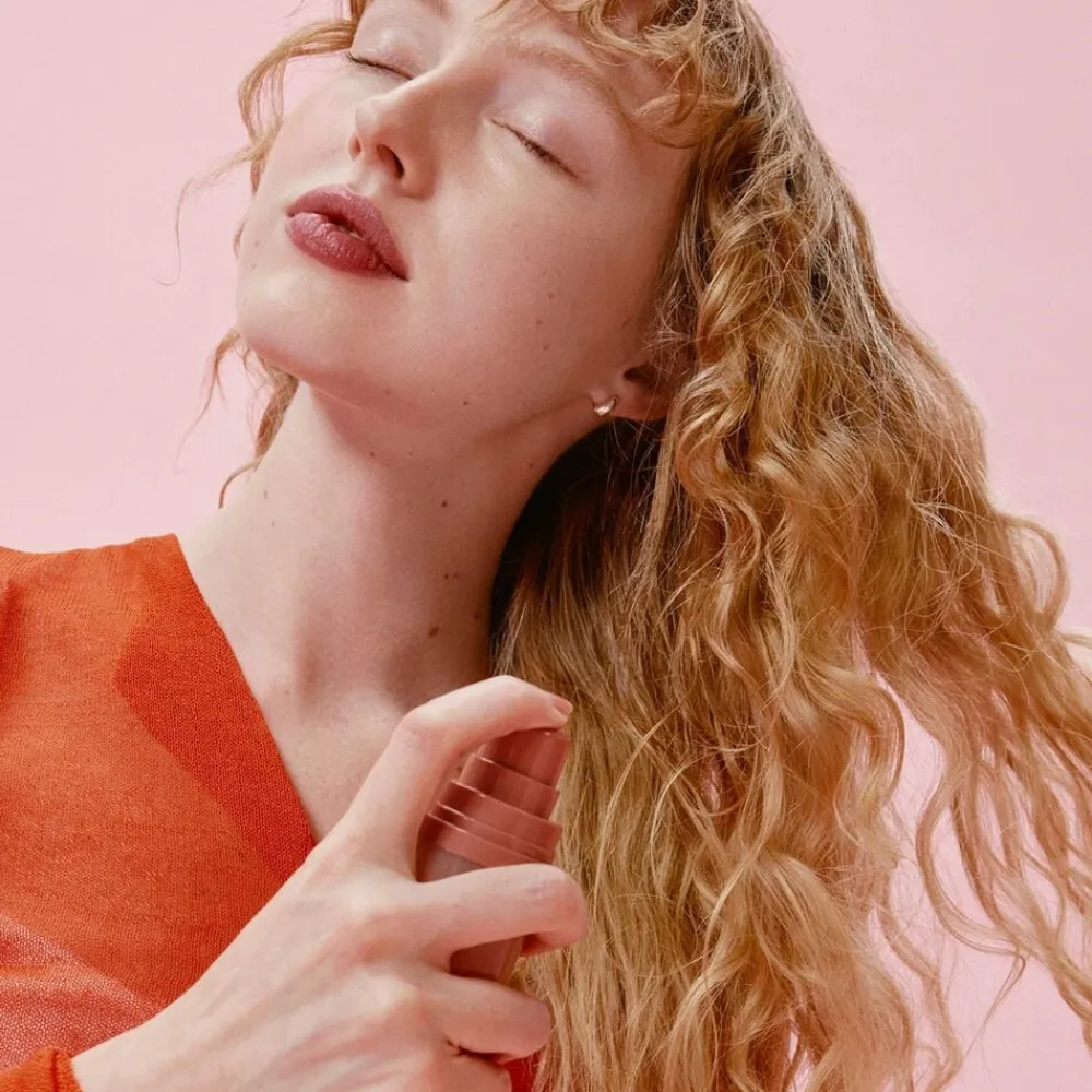 RARE BEAUTY Mini Find Comfort: Awaken Confidence - Essentielle fugtgivende kropspl
